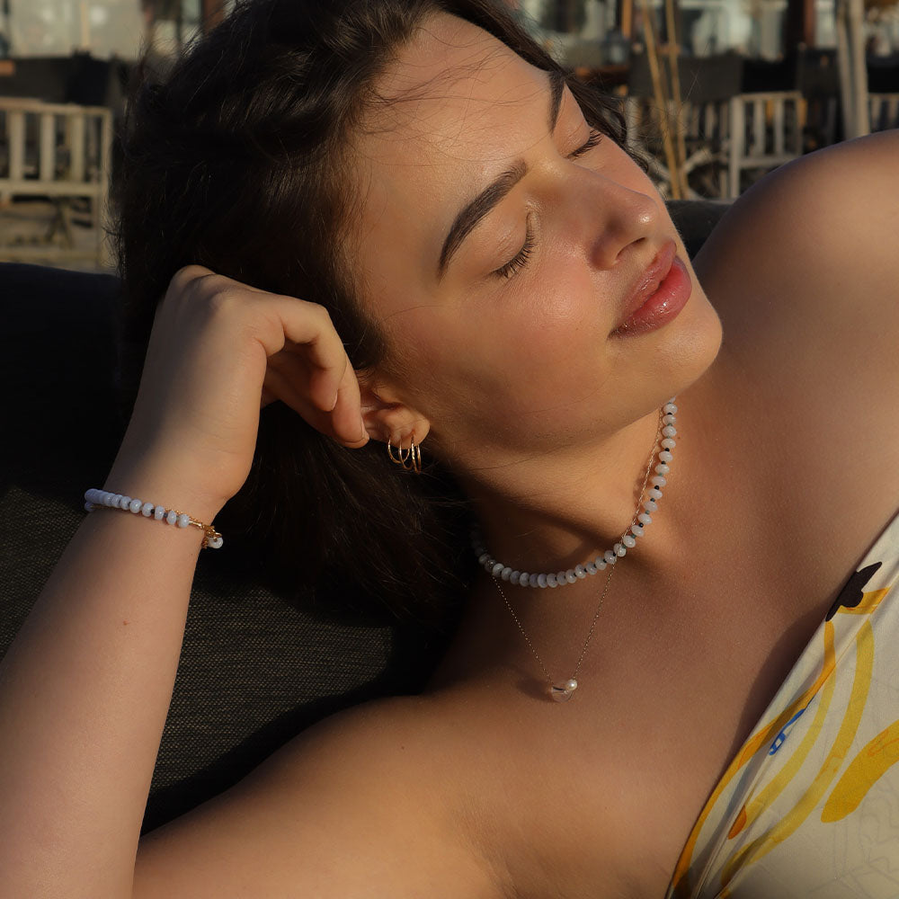 Woman relaxing outdoors with a blurred background