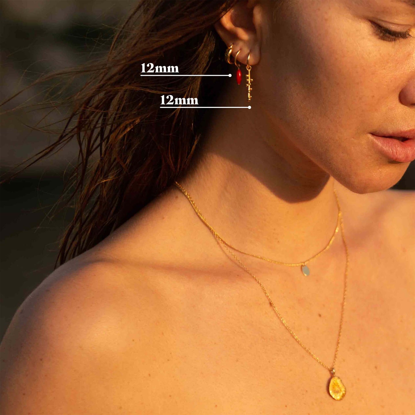 Gouden oorbellen met zomerse hangers