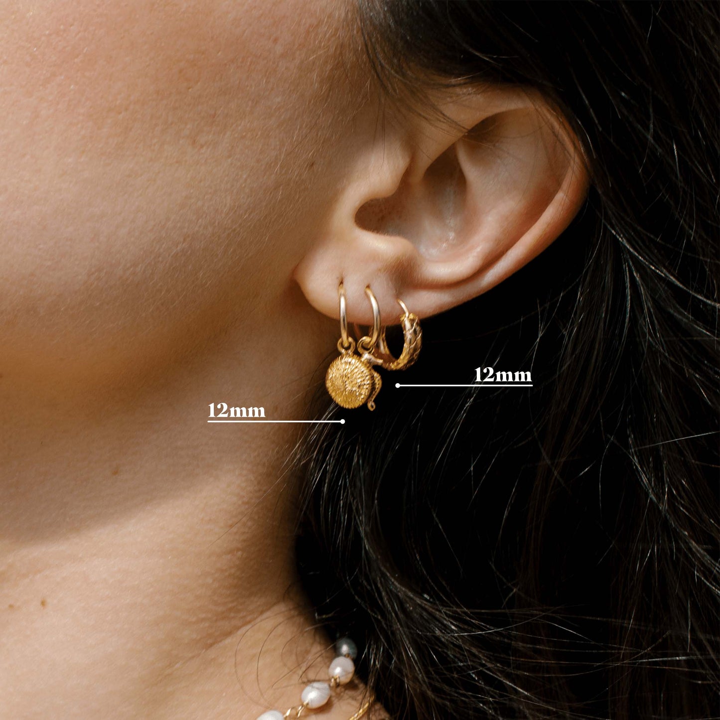 Gouden oorbellen met hangers