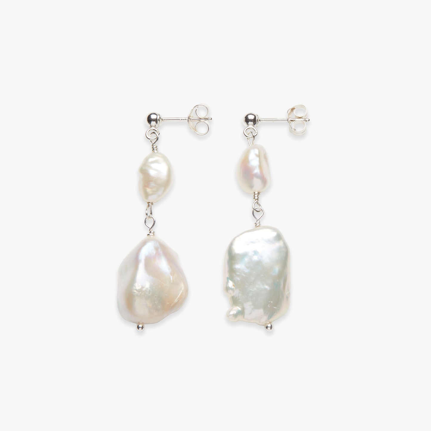 Pair of pearl earrings on a white background