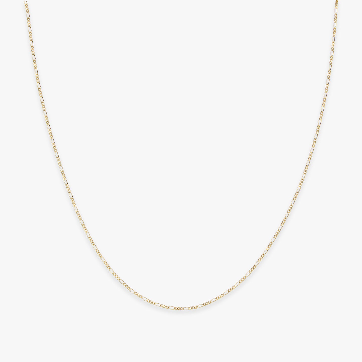 Gold chain necklace on a white background