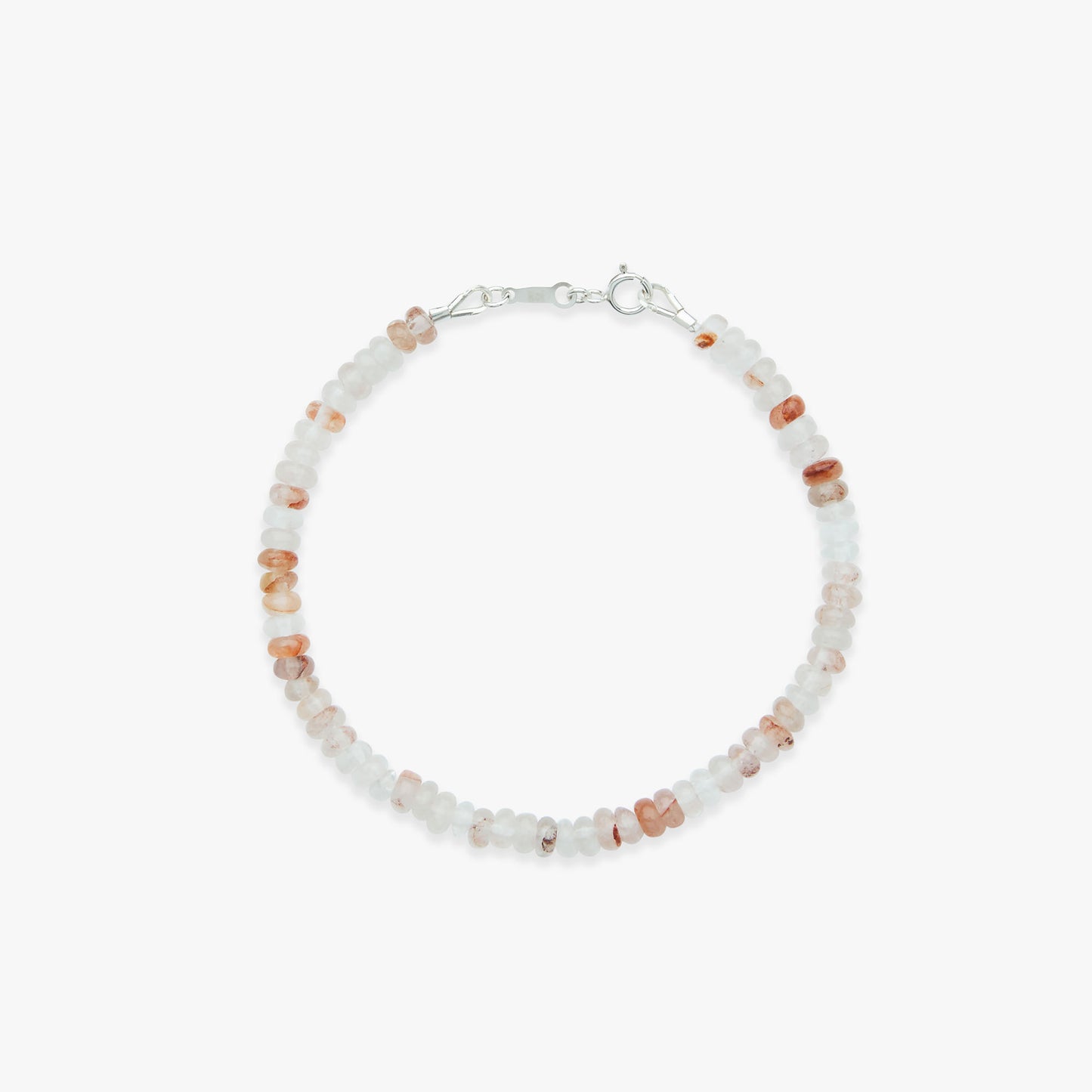 Beaded bracelet with white and orange beads on a white background