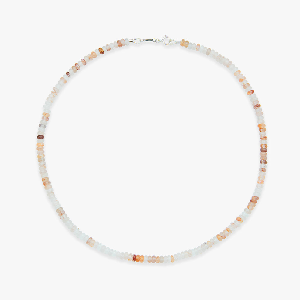Necklace with small beads on a white background