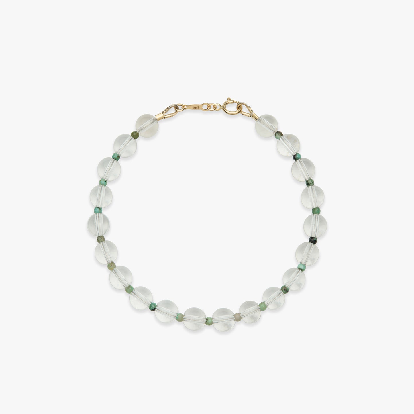 A beaded bracelet made of translucent pale green faceted beads with small dark green spacer beads and a gold clasp, shown on a light gray background.