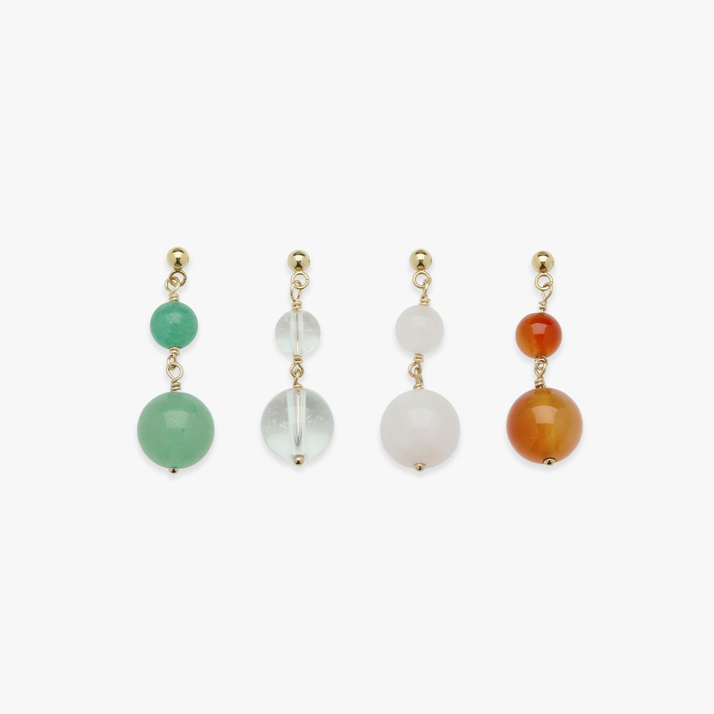 Set of four earrings with colored beads on a white background