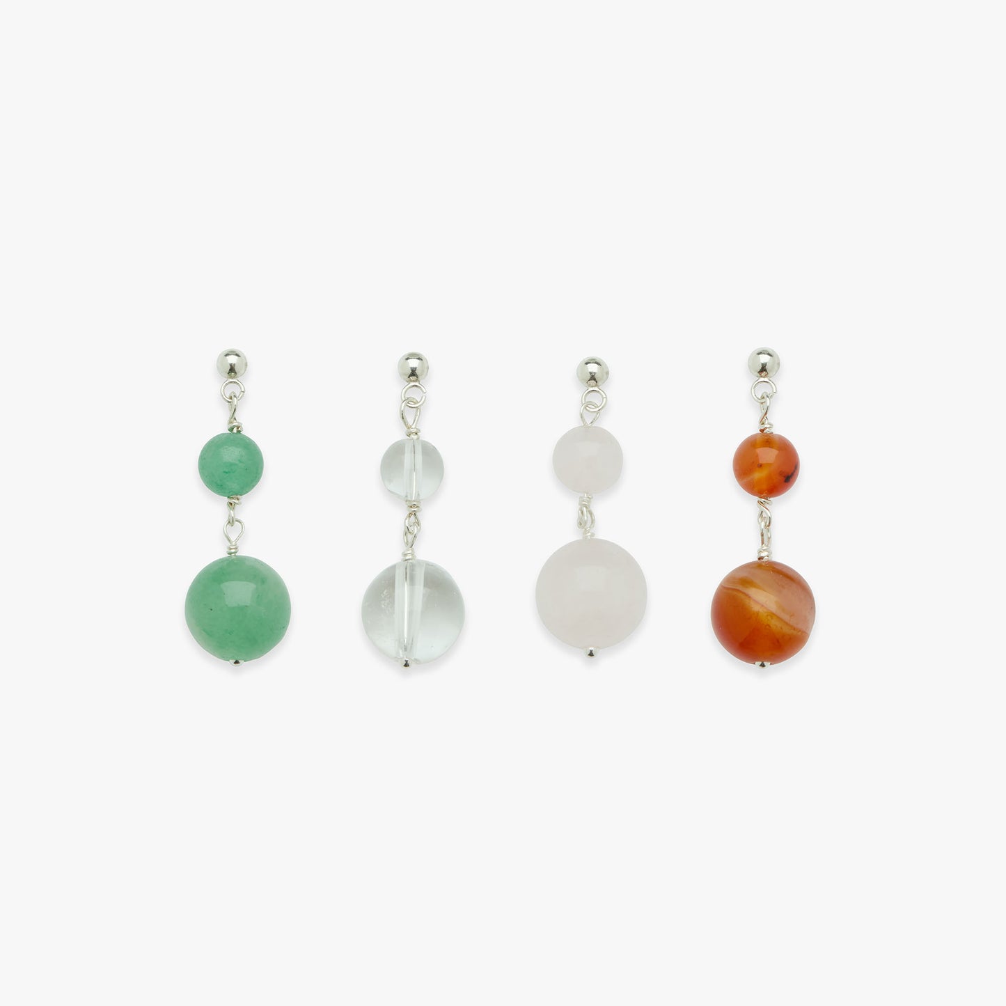Set of four earrings with different colored beads on a white background