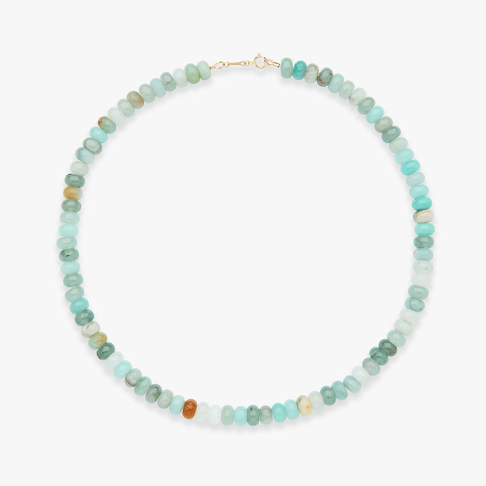 Necklace with multicolored beads on a white background