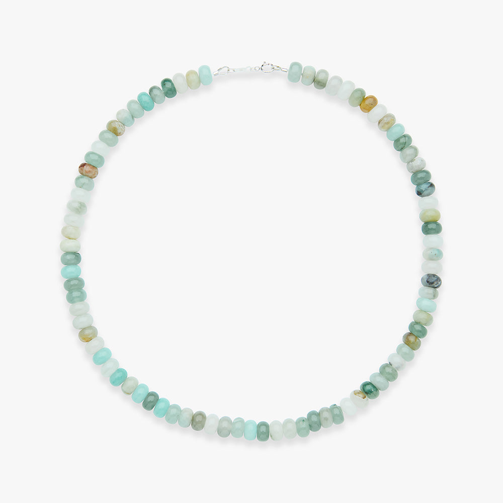 Necklace with small multicolored beads on a white background