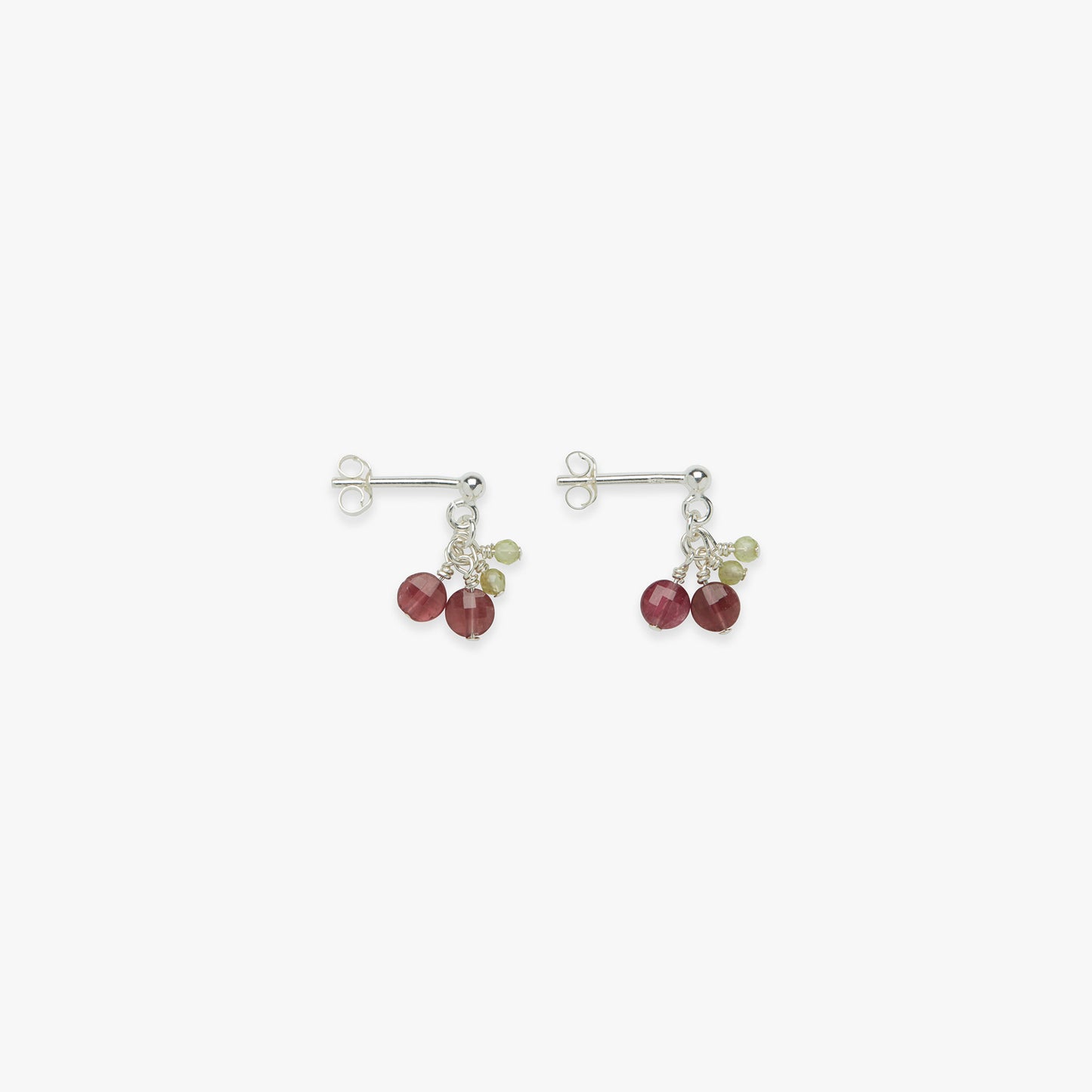 A pair of silver mini cherry stud earrings with red gemstones, displayed against a white background.
