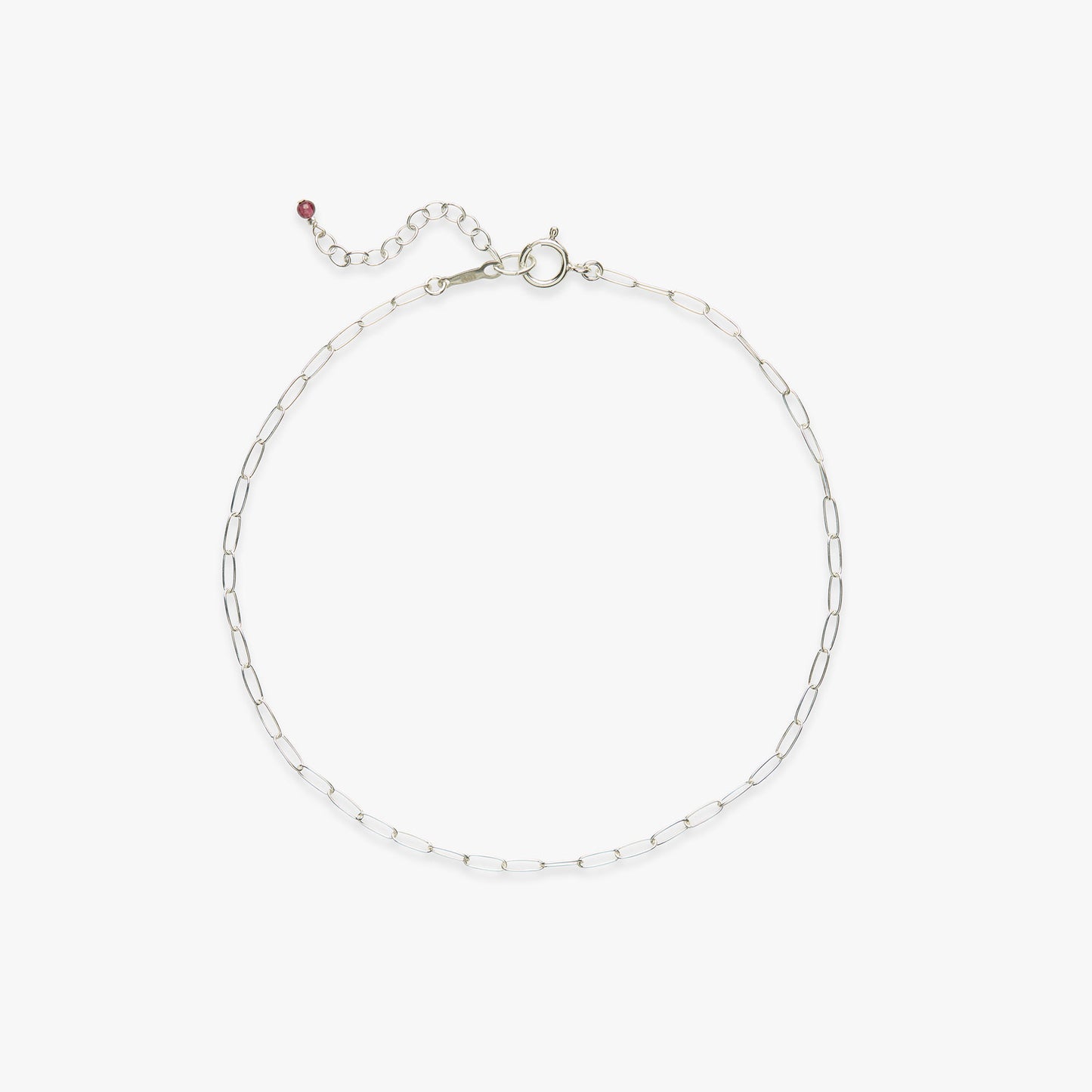 Silver chain anklet on a white background