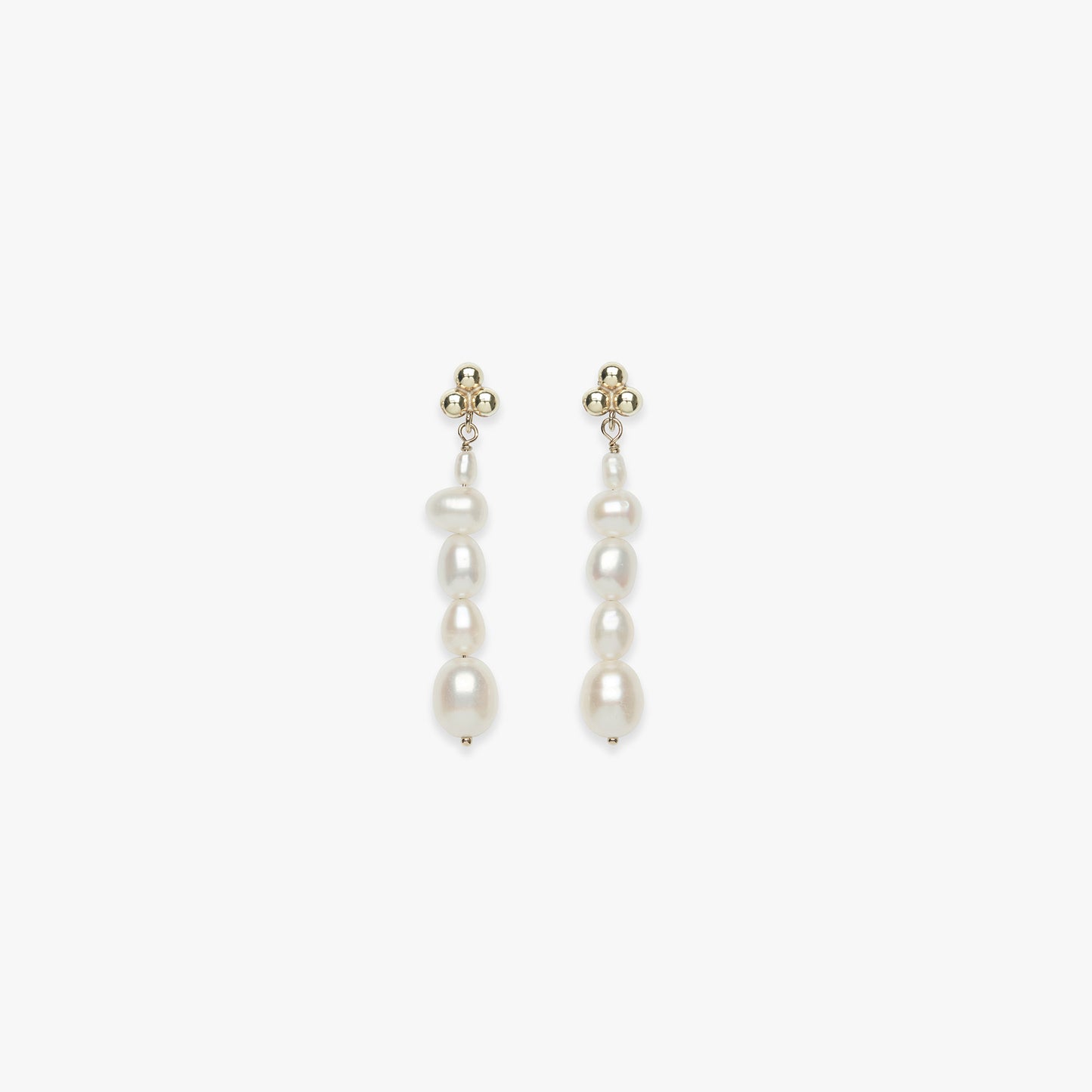 Pair of pearl earrings on a white background