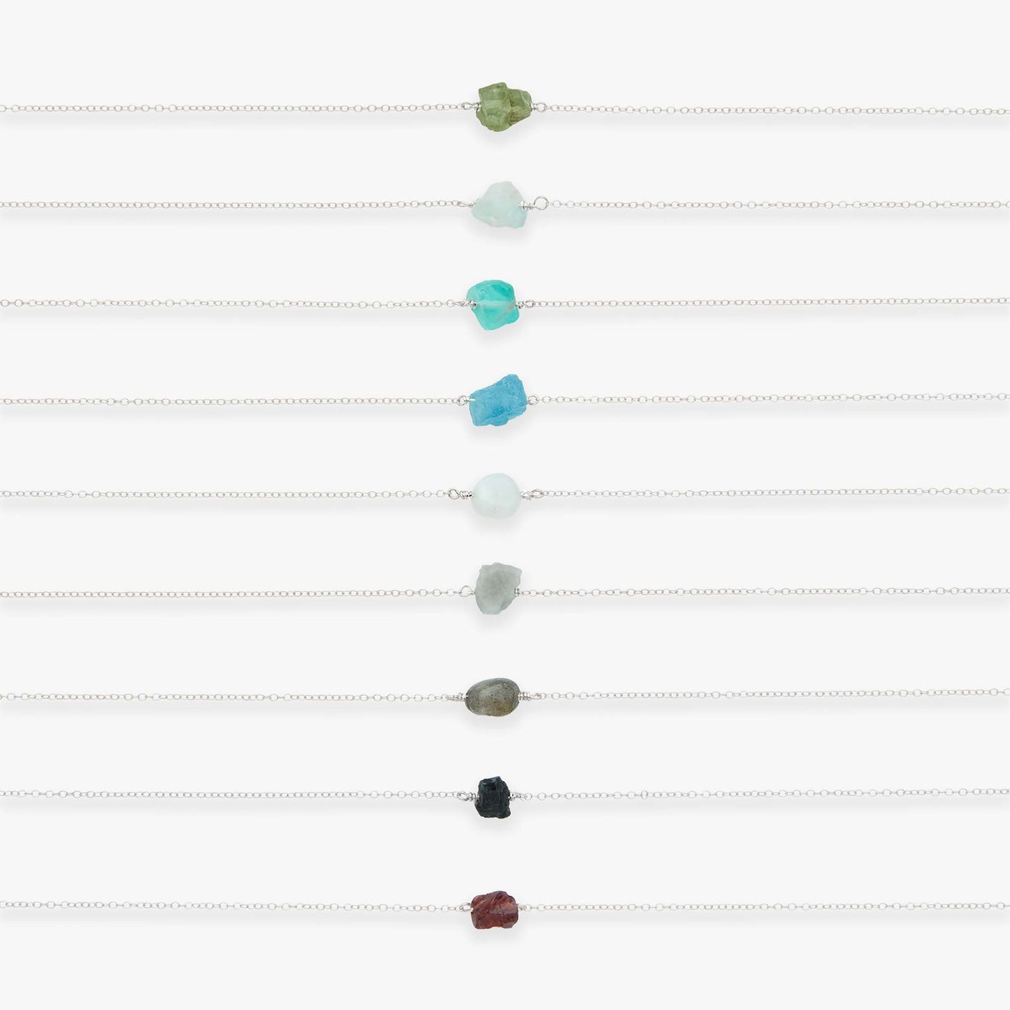 Color swatch with various colored stones on a white background