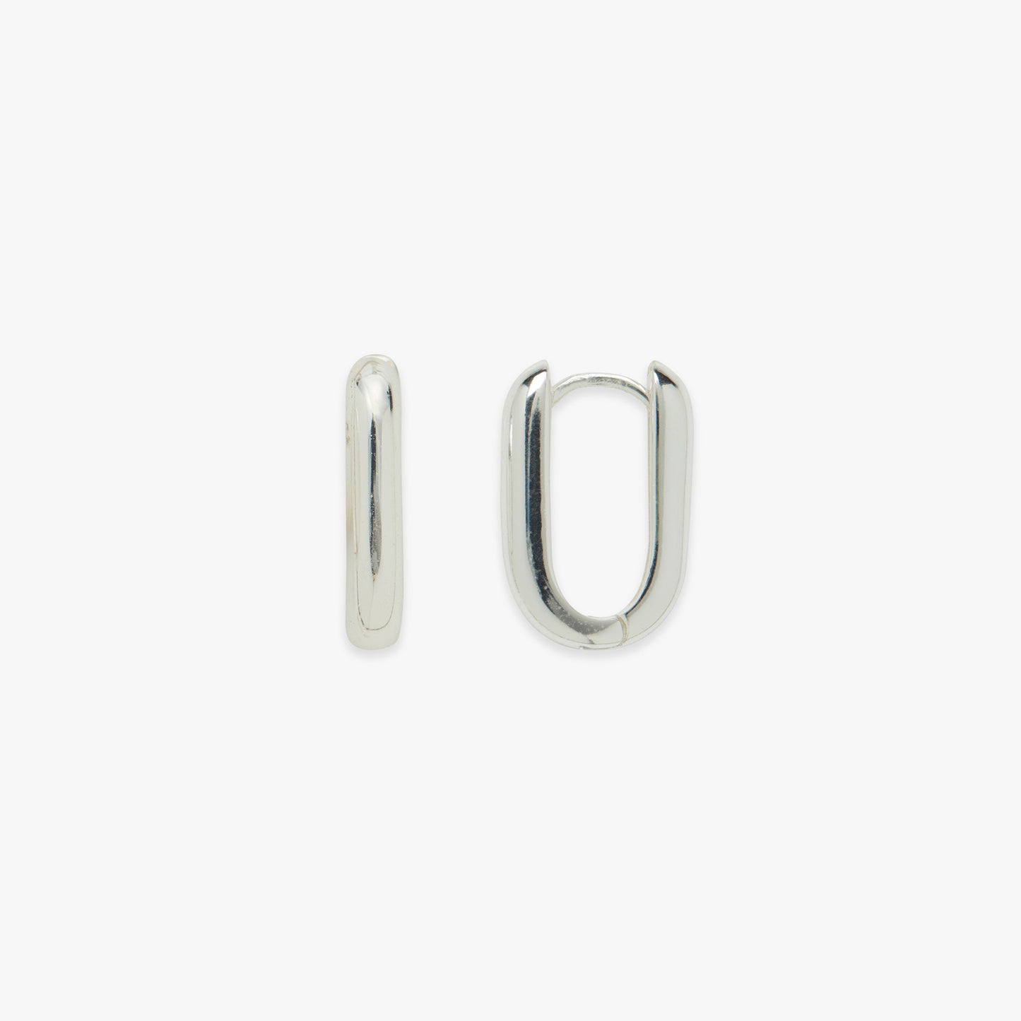 Pair of silver hoop earrings on a white background