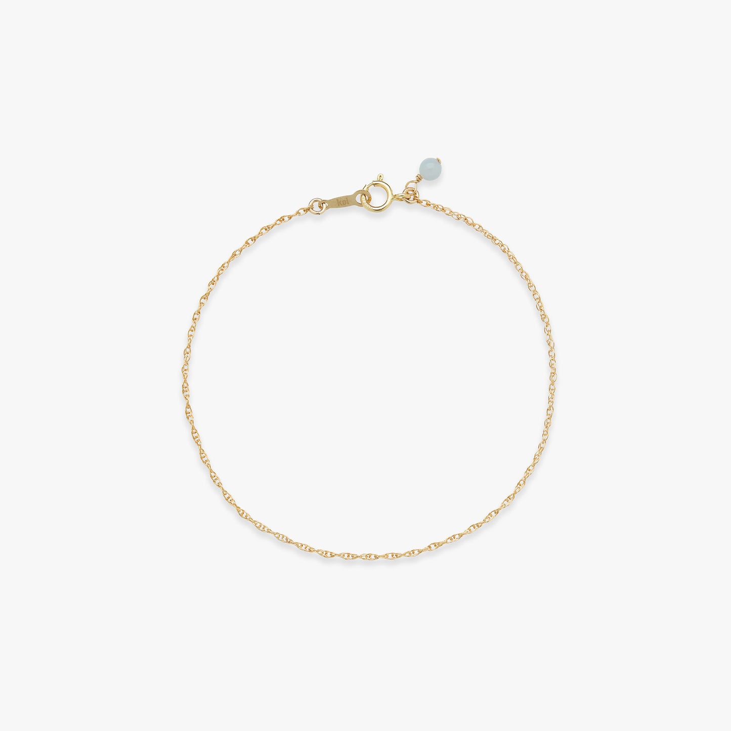 Gold bracelet on a white background