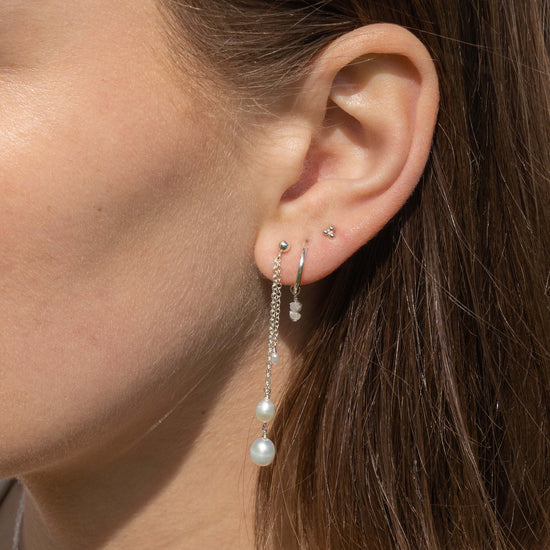 Zilveren oorbellen met parels en edelstenen
